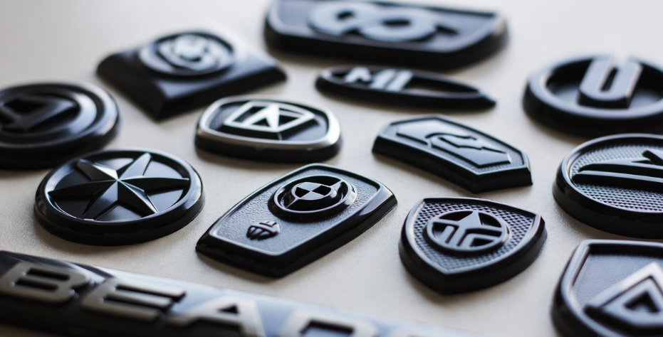 Custom plastic emblems and plastic decorative nameplates by King Epoxy Emblem Co., Ltd for product branding and identification